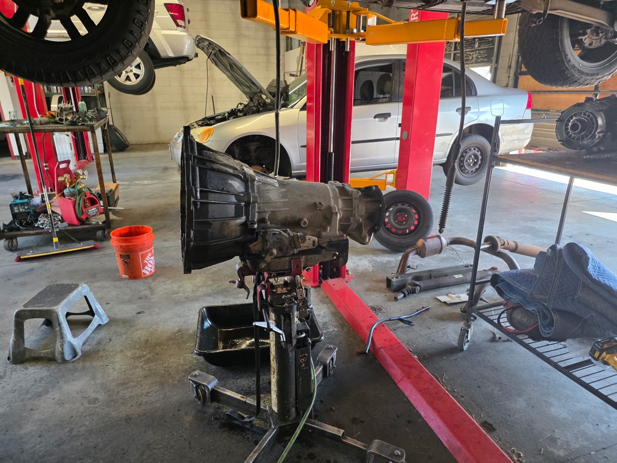A vehicle on the lift in the RPM service bay
